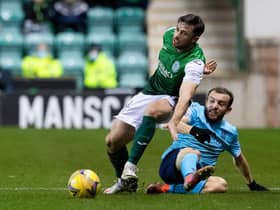 Lewis Stevenson battles for the ball with Dundee's Paul McMullan