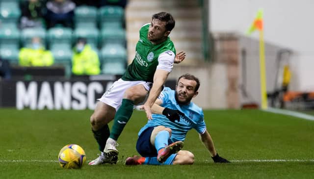 Lewis Stevenson battles for the ball with Dundee's Paul McMullan