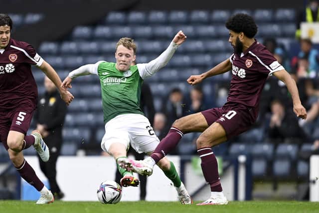 Hibs midfielder Jake Doyle-Hayes battles Hearts pair Peter Haring (left) and Ellis Simms during the Scottish Cup semi-final at Hampden Park. Picture: SNS
