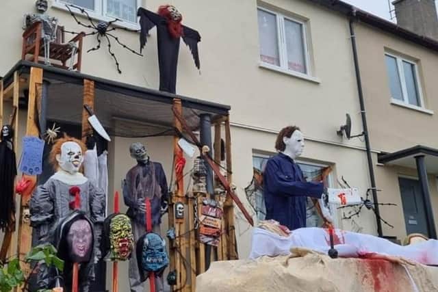 Pennywise (left) and Michael Myers (right) are just two of the spooky characters on display at the Sighthill Drive home.