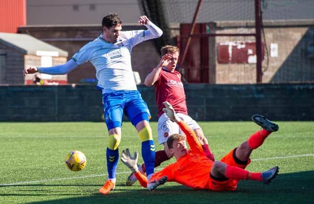 Paddy Martin foils Kilmarnock striker Kyle Lafferty during the Scottish Cup third-round match between Stenhousemuir and Kilmarnock at Ochilview