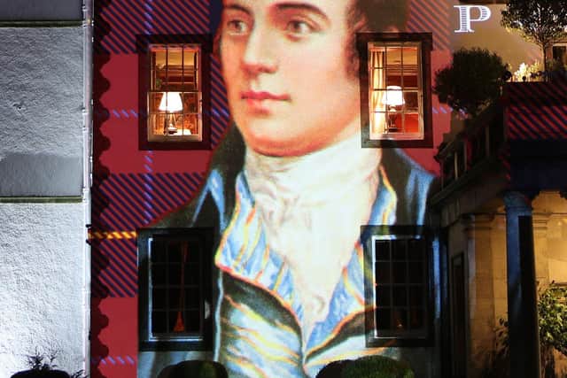 A portrait of Robert Burns projected on to the front of Prestonfield House in Edinburgh during Burns Night, 2018. (Image credit: Jane Barlow/PA Wire)
