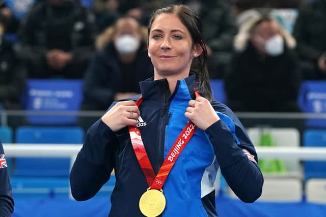 Team GB skip Eve Muirhead celebrates with her gold medal after victory in the in the women's team final against Japan. It is her fourth Winter Olympics. She won bronze at Sochi  in 2014