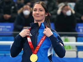 Team GB skip Eve Muirhead celebrates with her gold medal after victory in the in the women's team final against Japan. It is her fourth Winter Olympics. She won bronze at Sochi  in 2014