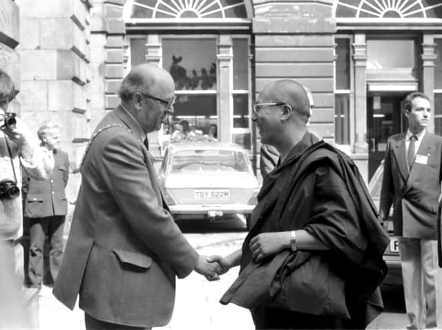 The Dalai Lama, spiritual leader of Tibet, is welcomed to Edinburgh City Chambers by Lord Provost John McKay in May 1984.