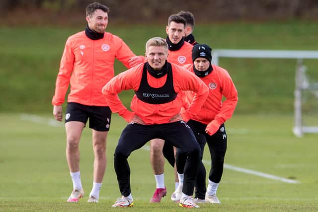 Taylor Moore training with teammates yesterday ahead of tomorrow's trip to Celtic Park. He is back in contention after serving his one-match ban