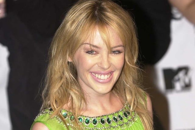 Australian singer, songwriter and actress Kylie Minogue smiled at fans as she walked down the red carpet.