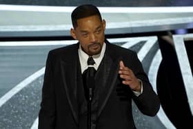 Will Smith cries as he accepts the award for best performance by an actor in a leading role for "King Richard" at the Oscars on Sunday, March 27, 2022, at the Dolby Theatre in Los Angeles. (AP Photo/Chris Pizzello)