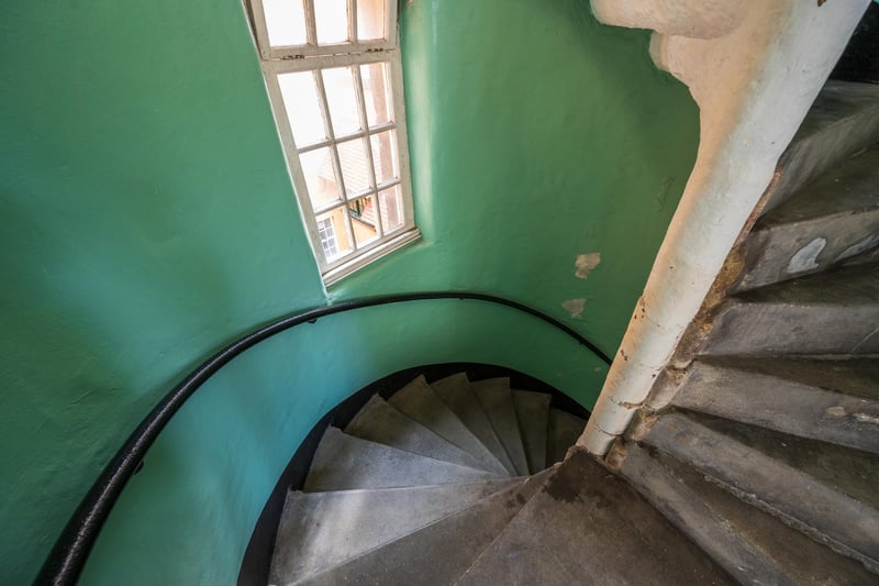 The spiral staircase leading to this Old Town flat.