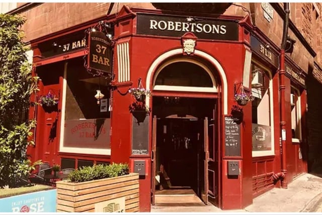 CAMRA says: Built as a four-storey red sandstone dwelling in the 19th century, the interior by P L Henderson is dated 1898. It is quite possible that the bar was much as it is today, apart from the rear left section where the original toilets were – these are now downstairs.