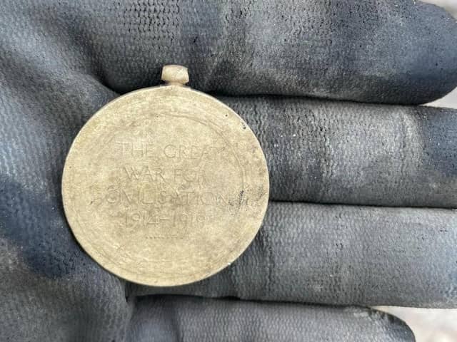 This World War One Victory Medal was found buried underneath the sand on Longniddry Beach in East Lothian. (Photo credit: Jillian Arrol)