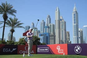 Bob MacIntyre hits his tee-shot on the first hole in the third round of the Omega Dubai Desert Classic at Emirates Golf Club. Picture: Andrew Redington/Getty Images.