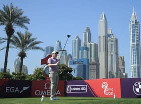 Bob MacIntyre hits his tee-shot on the first hole in the third round of the Omega Dubai Desert Classic at Emirates Golf Club. Picture: Andrew Redington/Getty Images.