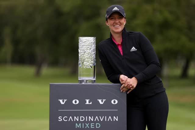 Swede Linn Grant poses with the trophy after winning the Volvo Car Scandinavian Mixed Hosted by Henrik & Annika at Halmstad Golf Club. Picture: Naomi Baker/Getty Images.