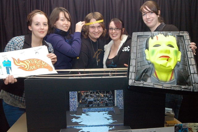 Youth theatre production of 'Frankenstein Came to Matlock' at the Palace Theatre, Mansfield in 2008. Students from Nottingham Trent University theatre design course are designing the sets and costumes.  Pictured with a model of the set and art work for the production are (left to right):Trent students Fiona Macpherson and  Lara Douglas, Benjamin Guy from Mansfield Woodhouse (who plays Frankenstein and is being measured for a latex mask), Trent students Victoria Steele, Emilee Swift.
