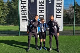 Rio Hamilton-Scott from Rosewell in Midlothian at the Juventus Academy in Dundee earlier this year, pictured with two of the coaches.