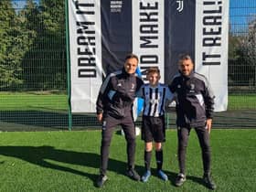 Rio Hamilton-Scott from Rosewell in Midlothian at the Juventus Academy in Dundee earlier this year, pictured with two of the coaches.
