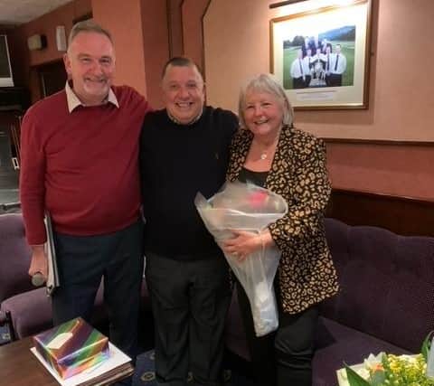 Carrickvale captain Stuart Gordon, left, with George and Babs Alexander at a presentation at the Capital club to mark his retiral. Picture: Carrickvale Golf Club