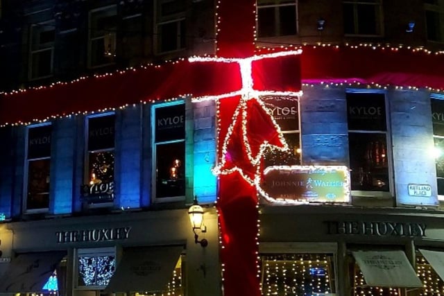 The Huxley on Rutland Street has wrapped itself up for Christmas in a giant red bow with glistening lights.