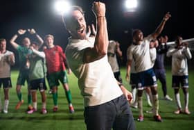 Joseph Fiennes (centre) plays England manager Gareth Southgate in the new BBC drama Dear England (Picture: BBC/Left Bank)
