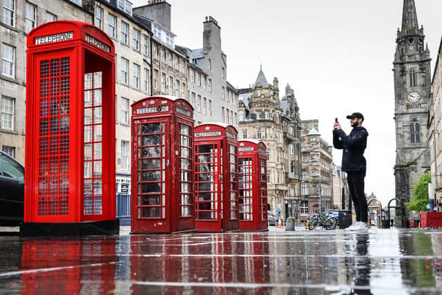 A Lego phone box was set up on the Royal Mile in preparation for the opening