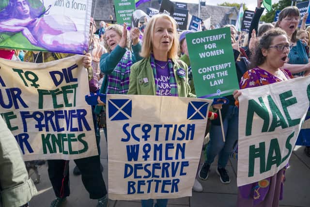 Campaigners from For Women Scotland outside the Scottish Parliament in Edinburgh hold a demonstration urging the Scottish Government to implement the Supreme Court ruling on gender (Picture: Jane Barlow/PA Wire)