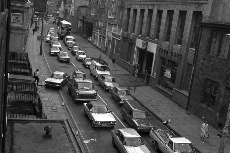 A new traffic system was introduced at East Fountainbridge in Edinburgh in June 1978. Cars are pictured passing the old SMT garage.