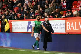 Darren McGregor makes his way off the pitch after receiving a red card