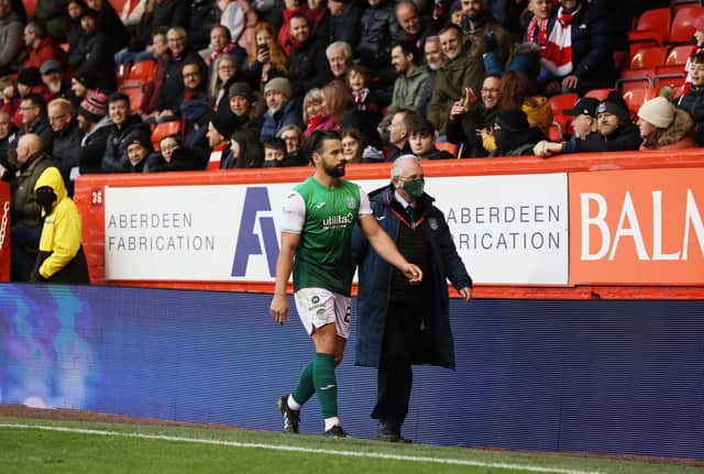 Darren McGregor makes his way off the pitch after receiving a red card
