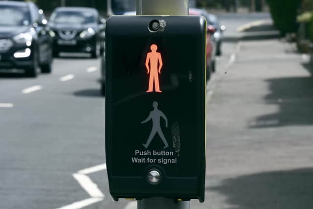 Pedestrians should be seeing far less of the red man in Edinburgh and Glasgow. Picture: Lisa Ferguson.