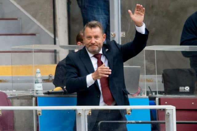 Hearts fans pay tribute to stadium announcer Scott Wilson. Picture: SNS