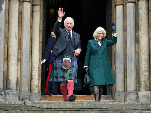 King Charles III and Camilla, the Queen Consort, leave Dunfermline Abbey, after a visit to mark its 950th anniversary (Picture: Andrew Milligan/pool/Getty Images)