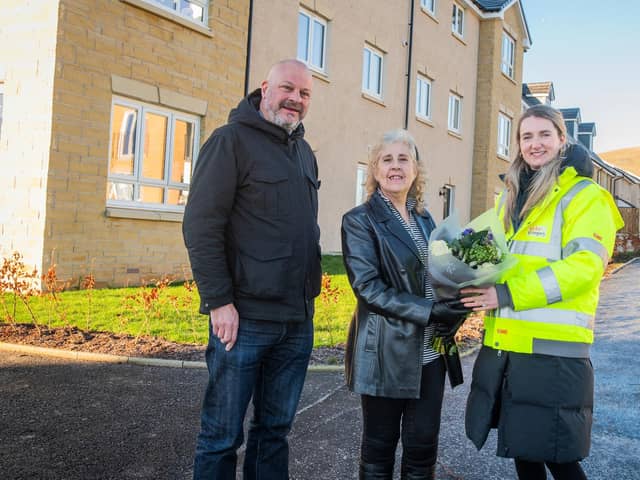 ​Neil Edgar and Susan Crawford with Ellen Clark, assistant land manager for Taylor Wimpey East Scotland.