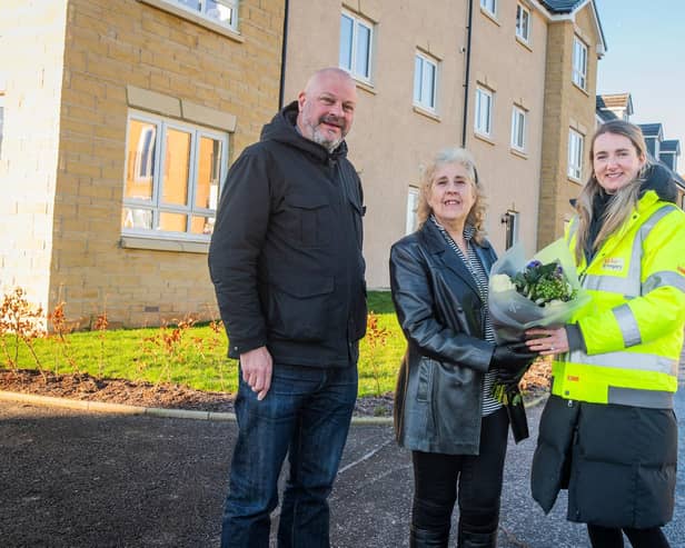​Neil Edgar and Susan Crawford with Ellen Clark, assistant land manager for Taylor Wimpey East Scotland.