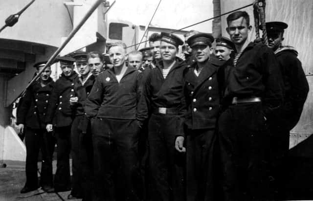 Russian sailors on their way to Scotland to collect the warships from Rosyth . They arrived following a hazardous journey with one vessel in their convoy hit by a torpedo, with  23 men killed. PIC: Contributed.