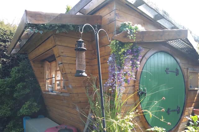 The hobbit house is located in Ali Hughson's back garden.