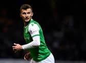 Hibs right-back Tom James has joined Wigan on loan until mid-January.