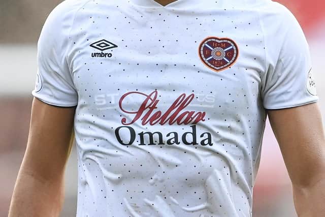 Stellar Omada will continue as the front-of-shirt sponsor for Hearts away kits next season. Picture: SNS
