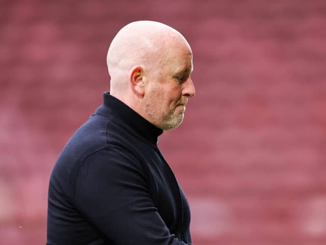 Livingston manager David Martindale looks dejected following the 4-1 defeat at Motherwell that confirmed his side's relegation. 