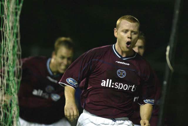 Phil Stamp celebrates after netting the late winner in the Edinburgh derby in 2002. Picture: SNS