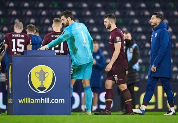 Hearts' Craig Gordon collects his medal during the William Hill Scottish Cup Final between Celtic and Hearts at Hampden Park, on December 20, 2020. (Photo by Rob Casey / SNS Group)
