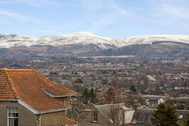The property boasts generously sized mature side and rear gardens and enjoys stunning views towards the Pentlands.