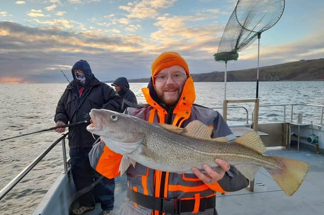 A flashback to when Aquamarine Charters were allowed to go to sea and Paul Christie landed this big cod. Pic: Aquamarine Charters