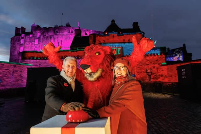 Maurice & Julia Maguire, co-owners of Majestic Wedding Cars Edinburgh and Rex the lion rampant
