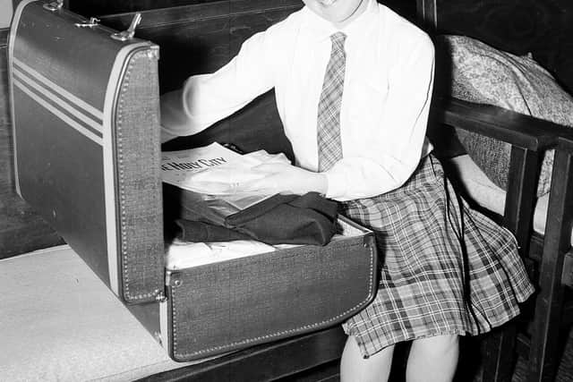 Marion Flemming age 13 packs her case to fly to Hollywood as guest of Roy Rogers
