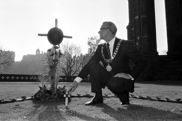 Edinburgh Lord Provost Kenneth Borthwick places the first poppy at the Garden of Remembrance in Princes Street Gardens in November 1978.