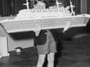 Ian Pemberton, seven, with a Lego model liner that was part of a Lego city built in London's Selfridges in 1962 (Picture: Kent Gavin/Keystone/Hulton Archive/Getty Images)
