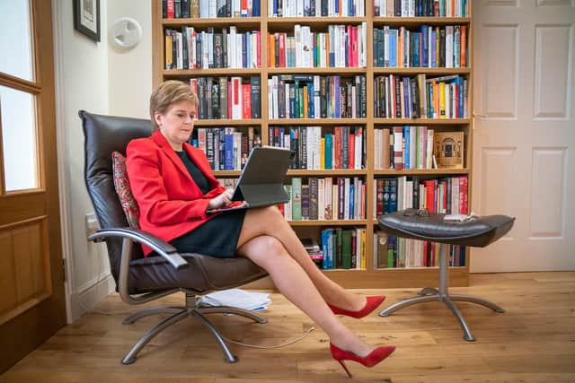 First Minister Nicola Sturgeon prepares her conference speech at her home in Glasgow on September 12, 2021, ahead of her virtual appearance at the SNP Conference on Monday.  Photo by JANE BARLOW/POOL/AFP via Getty Images.