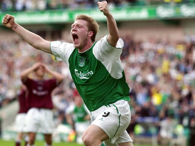 Garry O'Connor wheels away in delight after securing all three points for Hibs with an injury-time winner against Hearts in 2003. Picture: SNS