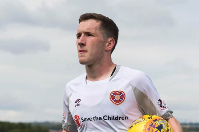 Hearts defender Bobby Burns faces an arduous journey home from Australia.